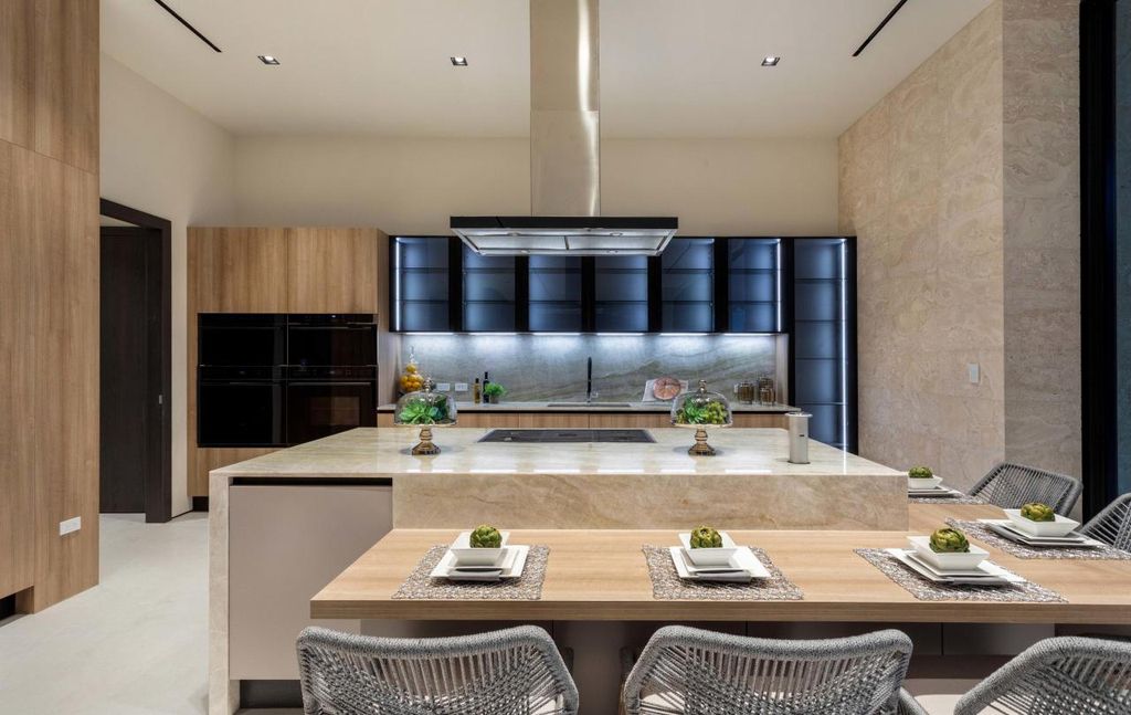 The Boca Raton House is an architectural deepwater estate in The Sanctuary with 3-levels of luxury and style now available for sale. This home located at 824 Pelican Point Cv, Boca Raton, Florida; offering 7 bedrooms and 10 bathrooms with over 7,300 square feet of living spaces.