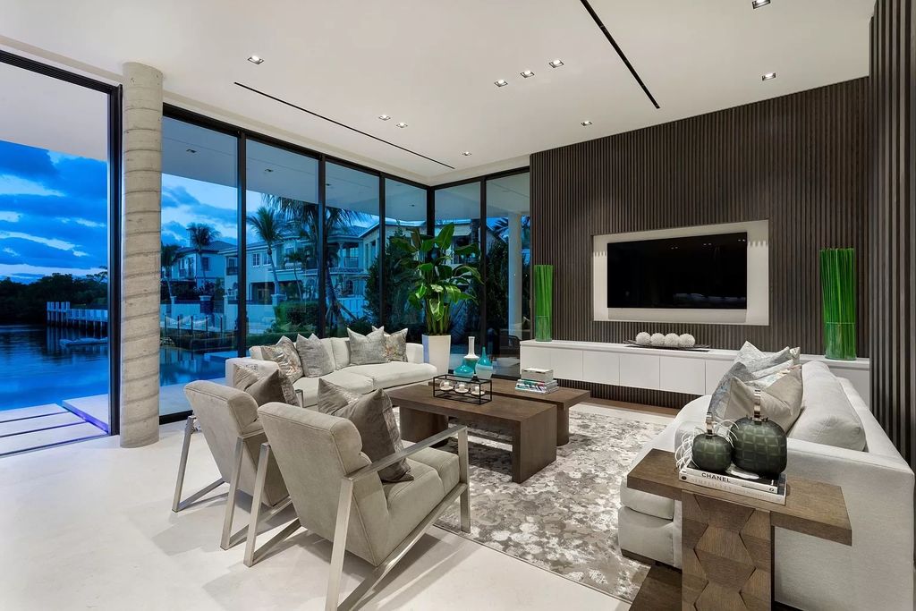 The Boca Raton House is an architectural deepwater estate in The Sanctuary with 3-levels of luxury and style now available for sale. This home located at 824 Pelican Point Cv, Boca Raton, Florida; offering 7 bedrooms and 10 bathrooms with over 7,300 square feet of living spaces.