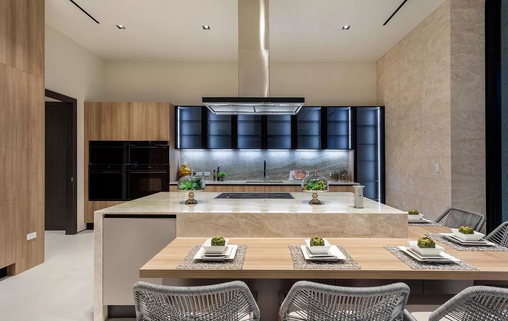 The Boca Raton House is an architectural deepwater estate in The Sanctuary with 3-levels of luxury and style now available for sale. This home located at 824 Pelican Point Cv, Boca Raton, Florida; offering 7 bedrooms and 10 bathrooms with over 7,300 square feet of living spaces.