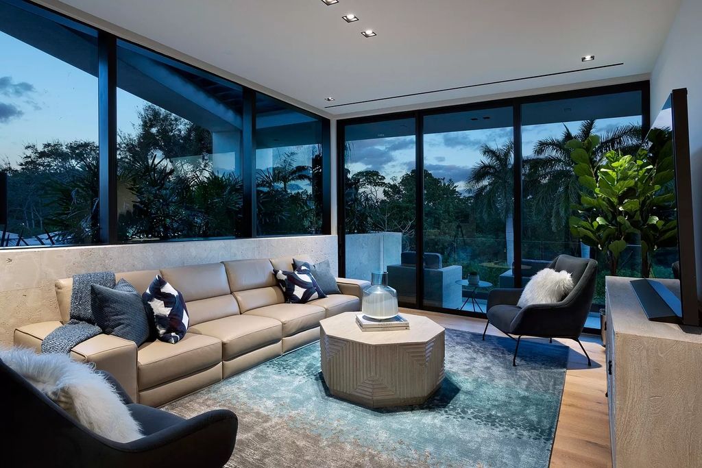 The Boca Raton House is an architectural deepwater estate in The Sanctuary with 3-levels of luxury and style now available for sale. This home located at 824 Pelican Point Cv, Boca Raton, Florida; offering 7 bedrooms and 10 bathrooms with over 7,300 square feet of living spaces.