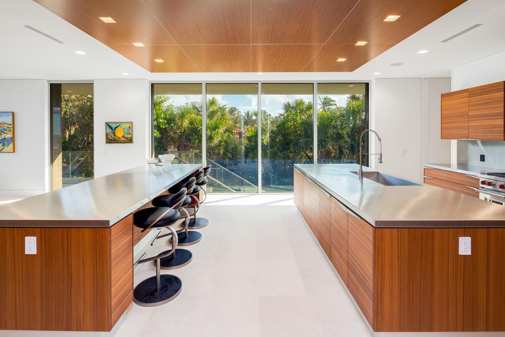 The Modern Mansion in Jupiter Island features spacious living and entertaining spaces with the most panoramic views of the Ocean now available for sale. This home located at 609 S Beach Rd, Jupiter, Florida; offering 6 bedrooms and 9 bathrooms with over 11,700 square feet of living spaces.