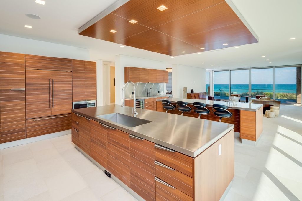 The Modern Mansion in Jupiter Island features spacious living and entertaining spaces with the most panoramic views of the Ocean now available for sale. This home located at 609 S Beach Rd, Jupiter, Florida; offering 6 bedrooms and 9 bathrooms with over 11,700 square feet of living spaces.