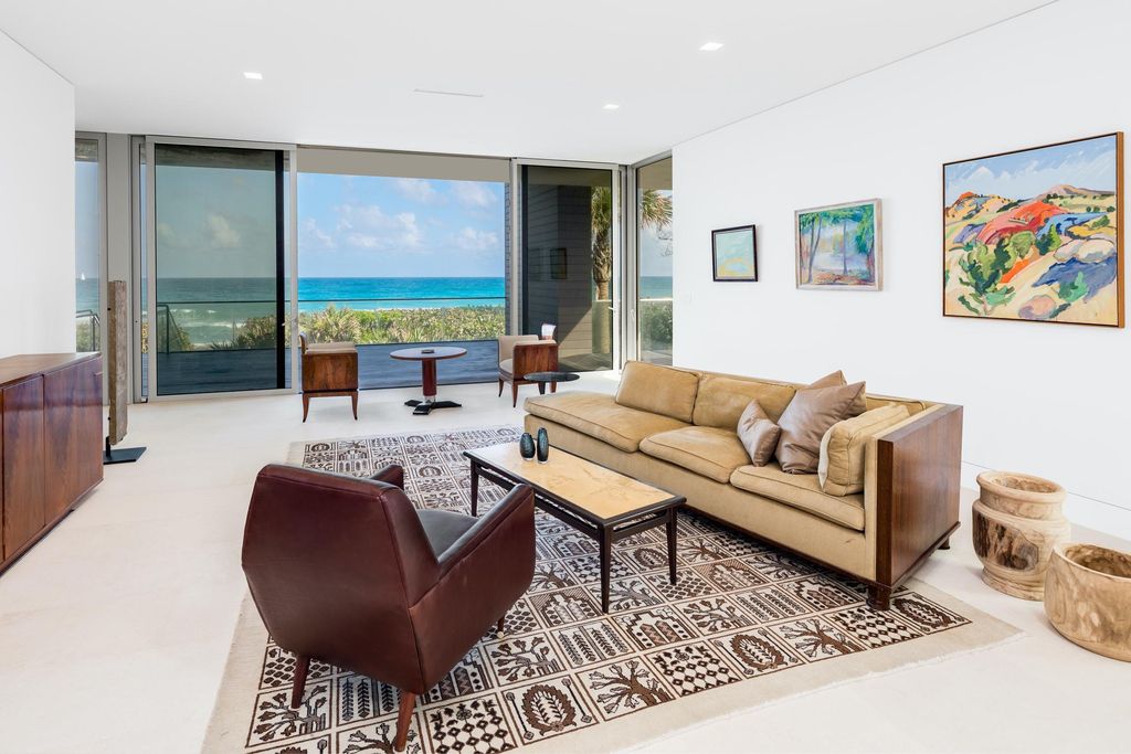 The Modern Mansion in Jupiter Island features spacious living and entertaining spaces with the most panoramic views of the Ocean now available for sale. This home located at 609 S Beach Rd, Jupiter, Florida; offering 6 bedrooms and 9 bathrooms with over 11,700 square feet of living spaces.