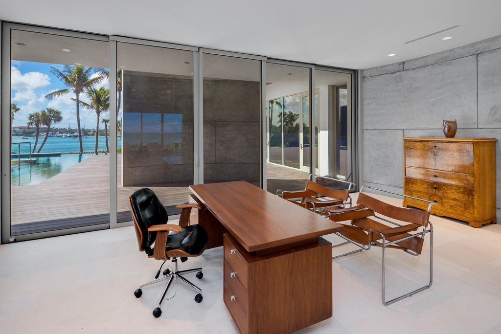 The Modern Mansion in Jupiter Island features spacious living and entertaining spaces with the most panoramic views of the Ocean now available for sale. This home located at 609 S Beach Rd, Jupiter, Florida; offering 6 bedrooms and 9 bathrooms with over 11,700 square feet of living spaces.