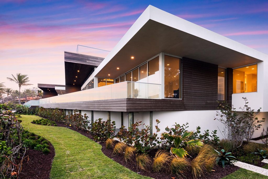 The Modern Mansion in Jupiter Island features spacious living and entertaining spaces with the most panoramic views of the Ocean now available for sale. This home located at 609 S Beach Rd, Jupiter, Florida; offering 6 bedrooms and 9 bathrooms with over 11,700 square feet of living spaces.