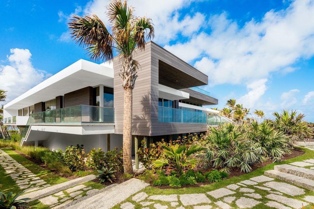 The Modern Mansion in Jupiter Island features spacious living and entertaining spaces with the most panoramic views of the Ocean now available for sale. This home located at 609 S Beach Rd, Jupiter, Florida; offering 6 bedrooms and 9 bathrooms with over 11,700 square feet of living spaces.