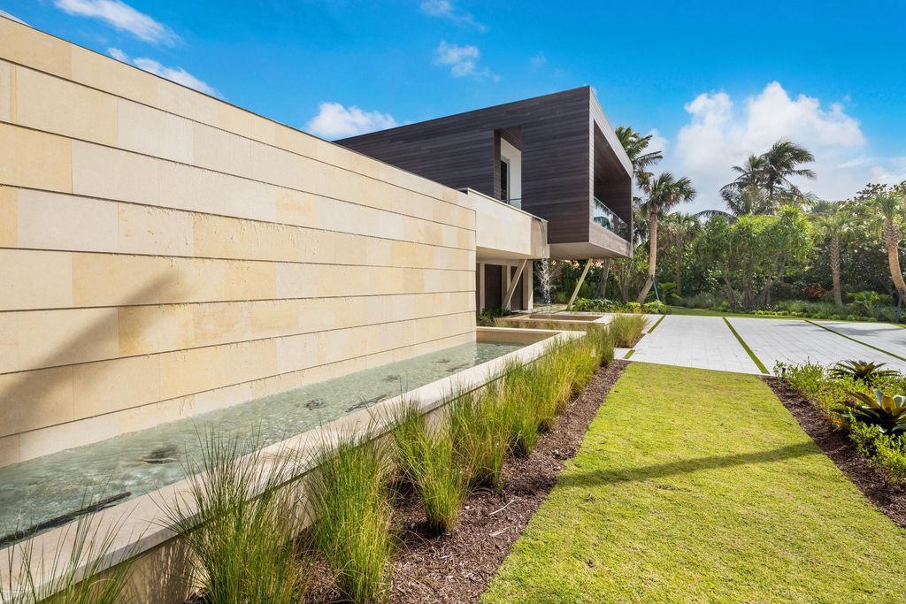The Modern Mansion in Jupiter Island features spacious living and entertaining spaces with the most panoramic views of the Ocean now available for sale. This home located at 609 S Beach Rd, Jupiter, Florida; offering 6 bedrooms and 9 bathrooms with over 11,700 square feet of living spaces.