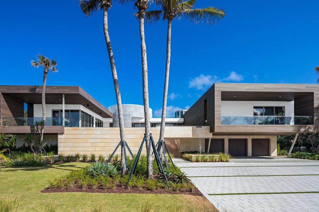 The Modern Mansion in Jupiter Island features spacious living and entertaining spaces with the most panoramic views of the Ocean now available for sale. This home located at 609 S Beach Rd, Jupiter, Florida; offering 6 bedrooms and 9 bathrooms with over 11,700 square feet of living spaces.