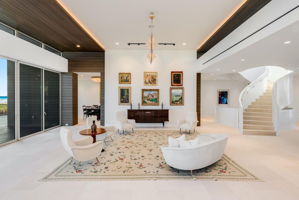 The Modern Mansion in Jupiter Island features spacious living and entertaining spaces with the most panoramic views of the Ocean now available for sale. This home located at 609 S Beach Rd, Jupiter, Florida; offering 6 bedrooms and 9 bathrooms with over 11,700 square feet of living spaces.