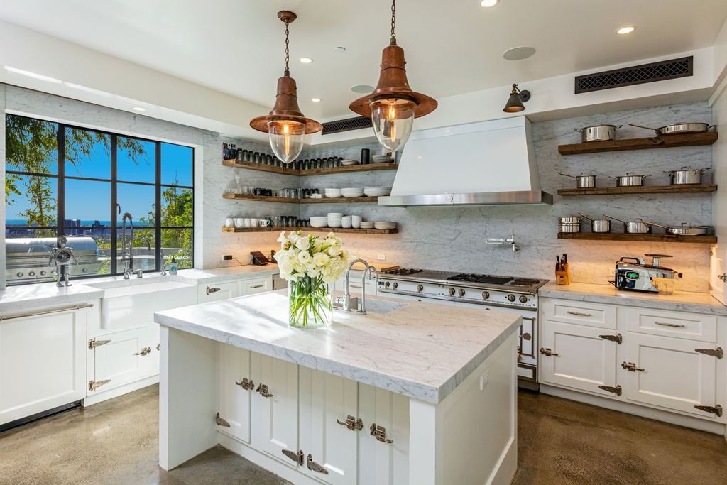 The Modern Farmhouse in Los Angeles is a private gated celebrity compound with large motor court in the Sunset Strip now available for sale. This home located at 1500 Forest Knoll Dr, Los Angeles, California; offering 5 bedrooms and 7 bathrooms with over 6,300 square feet of living spaces.