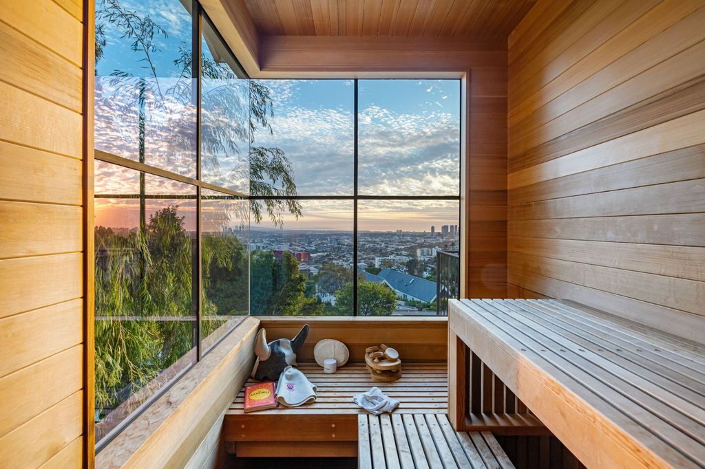 The Modern Farmhouse in Los Angeles is a private gated celebrity compound with large motor court in the Sunset Strip now available for sale. This home located at 1500 Forest Knoll Dr, Los Angeles, California; offering 5 bedrooms and 7 bathrooms with over 6,300 square feet of living spaces.