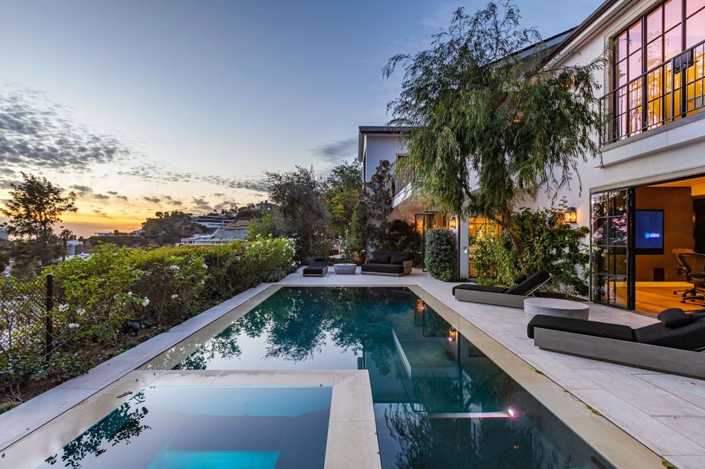 The Modern Farmhouse in Los Angeles is a private gated celebrity compound with large motor court in the Sunset Strip now available for sale. This home located at 1500 Forest Knoll Dr, Los Angeles, California; offering 5 bedrooms and 7 bathrooms with over 6,300 square feet of living spaces.