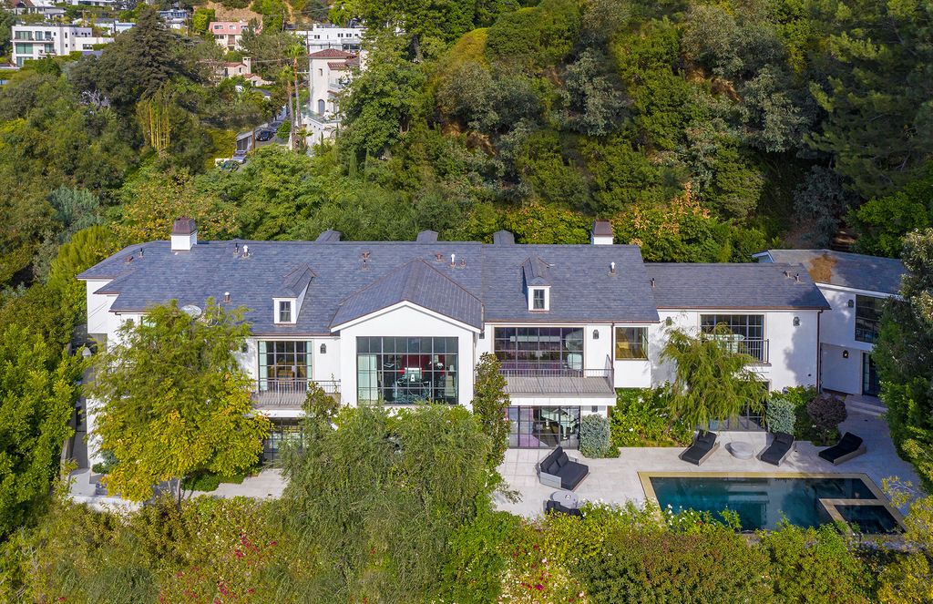The Modern Farmhouse in Los Angeles is a private gated celebrity compound with large motor court in the Sunset Strip now available for sale. This home located at 1500 Forest Knoll Dr, Los Angeles, California; offering 5 bedrooms and 7 bathrooms with over 6,300 square feet of living spaces.