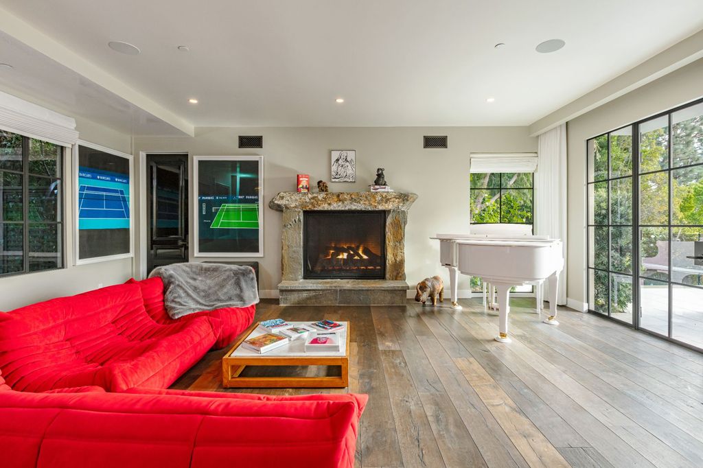 The Modern Farmhouse in Los Angeles is a private gated celebrity compound with large motor court in the Sunset Strip now available for sale. This home located at 1500 Forest Knoll Dr, Los Angeles, California; offering 5 bedrooms and 7 bathrooms with over 6,300 square feet of living spaces.
