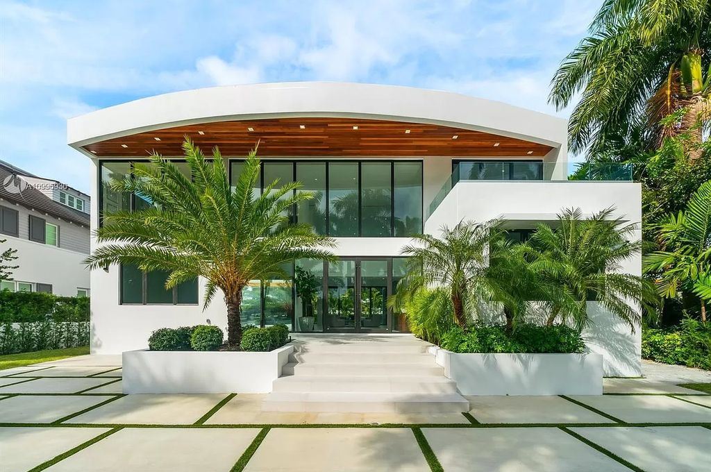 The Home in Miami Beach is a new construction modern oasis located on guard gated Hibiscus Island now available for sale. This home located at 112 W Palm Midway, Miami Beach, Florida; offering 5 bedrooms and 6 bathrooms with over 4,400 square feet of living spaces.