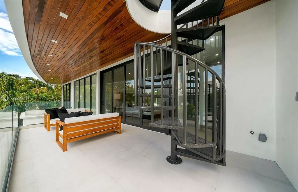 The Home in Miami Beach is a new construction modern oasis located on guard gated Hibiscus Island now available for sale. This home located at 112 W Palm Midway, Miami Beach, Florida; offering 5 bedrooms and 6 bathrooms with over 4,400 square feet of living spaces.