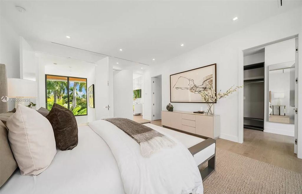 The Home in Miami Beach is a new construction modern oasis located on guard gated Hibiscus Island now available for sale. This home located at 112 W Palm Midway, Miami Beach, Florida; offering 5 bedrooms and 6 bathrooms with over 4,400 square feet of living spaces.