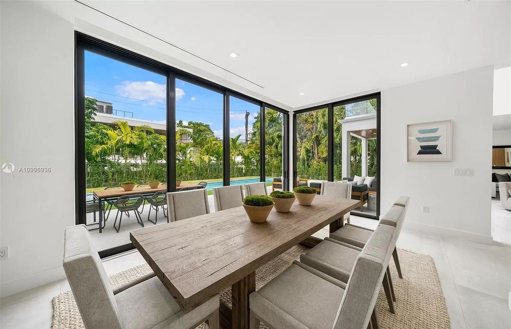 The Home in Miami Beach is a new construction modern oasis located on guard gated Hibiscus Island now available for sale. This home located at 112 W Palm Midway, Miami Beach, Florida; offering 5 bedrooms and 6 bathrooms with over 4,400 square feet of living spaces.