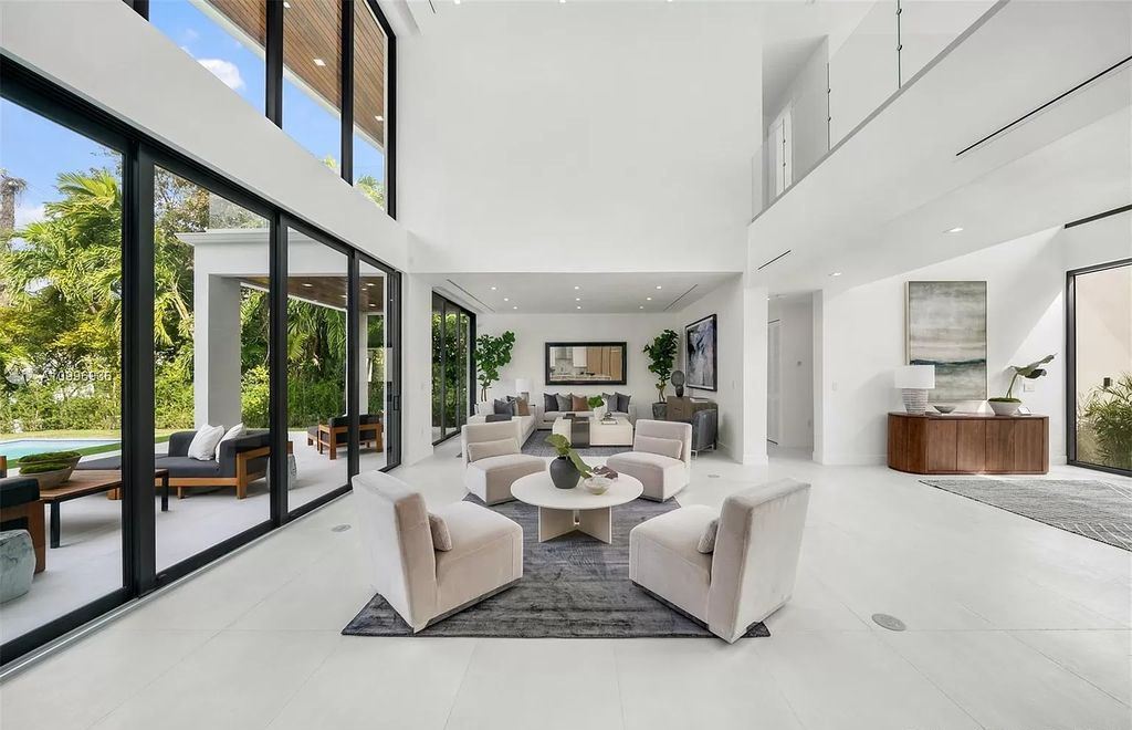 The Home in Miami Beach is a new construction modern oasis located on guard gated Hibiscus Island now available for sale. This home located at 112 W Palm Midway, Miami Beach, Florida; offering 5 bedrooms and 6 bathrooms with over 4,400 square feet of living spaces.