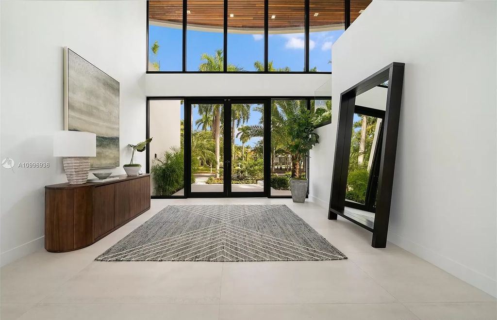 The Home in Miami Beach is a new construction modern oasis located on guard gated Hibiscus Island now available for sale. This home located at 112 W Palm Midway, Miami Beach, Florida; offering 5 bedrooms and 6 bathrooms with over 4,400 square feet of living spaces.