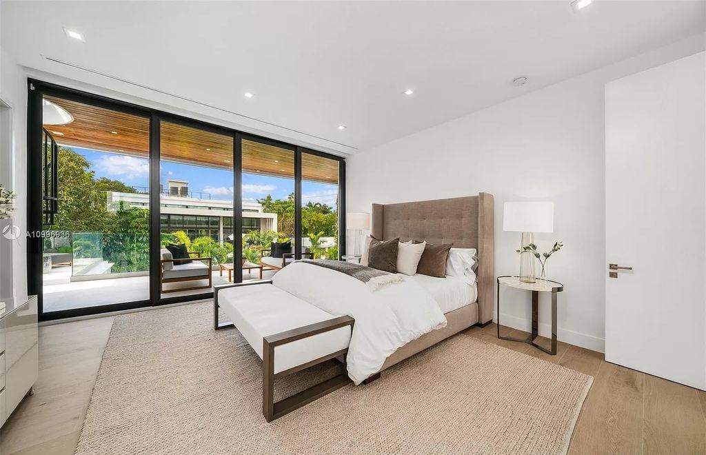 The Home in Miami Beach is a new construction modern oasis located on guard gated Hibiscus Island now available for sale. This home located at 112 W Palm Midway, Miami Beach, Florida; offering 5 bedrooms and 6 bathrooms with over 4,400 square feet of living spaces.