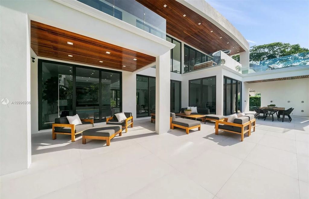 The Home in Miami Beach is a new construction modern oasis located on guard gated Hibiscus Island now available for sale. This home located at 112 W Palm Midway, Miami Beach, Florida; offering 5 bedrooms and 6 bathrooms with over 4,400 square feet of living spaces.