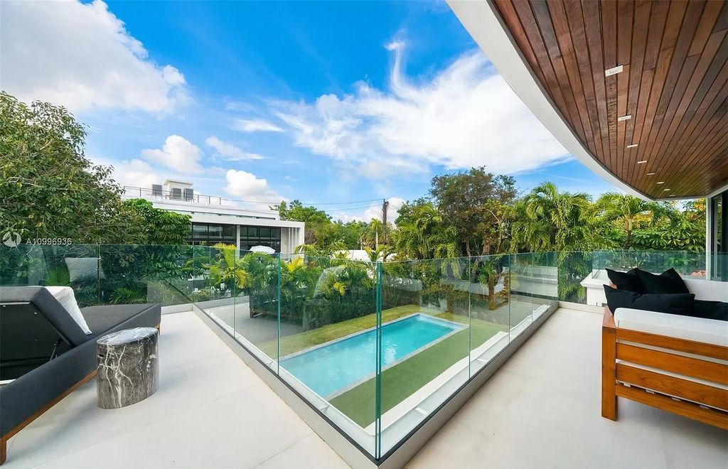 The Home in Miami Beach is a new construction modern oasis located on guard gated Hibiscus Island now available for sale. This home located at 112 W Palm Midway, Miami Beach, Florida; offering 5 bedrooms and 6 bathrooms with over 4,400 square feet of living spaces.