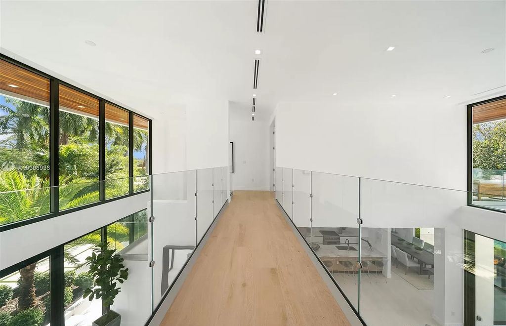 The Home in Miami Beach is a new construction modern oasis located on guard gated Hibiscus Island now available for sale. This home located at 112 W Palm Midway, Miami Beach, Florida; offering 5 bedrooms and 6 bathrooms with over 4,400 square feet of living spaces.