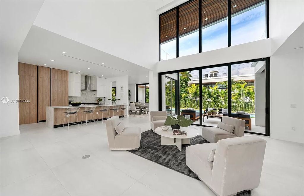 The Home in Miami Beach is a new construction modern oasis located on guard gated Hibiscus Island now available for sale. This home located at 112 W Palm Midway, Miami Beach, Florida; offering 5 bedrooms and 6 bathrooms with over 4,400 square feet of living spaces.