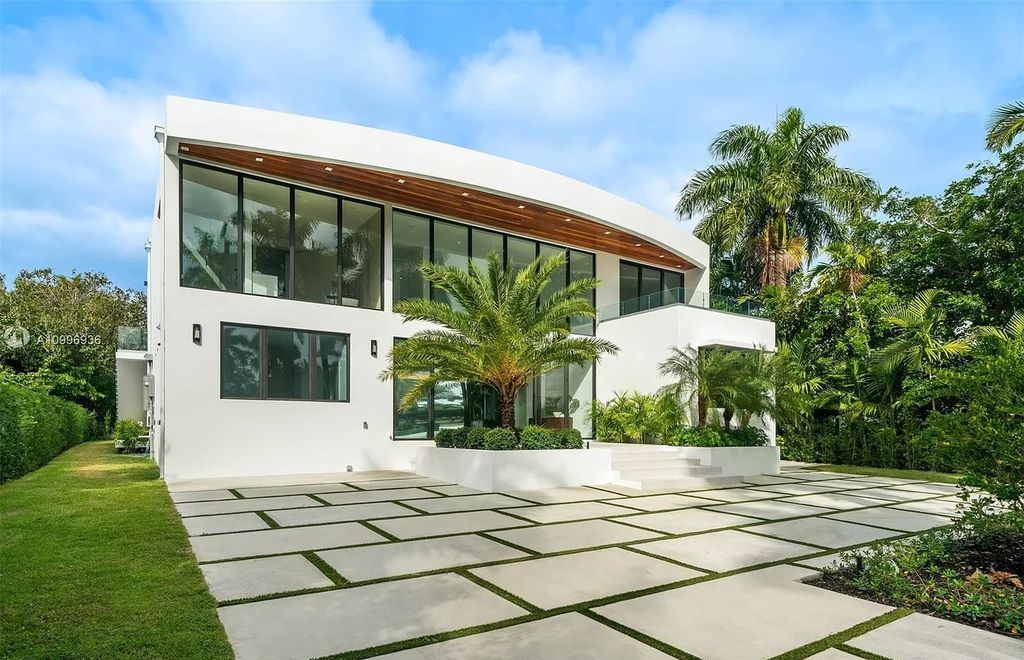 The Home in Miami Beach is a new construction modern oasis located on guard gated Hibiscus Island now available for sale. This home located at 112 W Palm Midway, Miami Beach, Florida; offering 5 bedrooms and 6 bathrooms with over 4,400 square feet of living spaces.