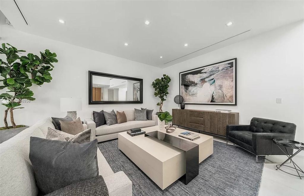 The Home in Miami Beach is a new construction modern oasis located on guard gated Hibiscus Island now available for sale. This home located at 112 W Palm Midway, Miami Beach, Florida; offering 5 bedrooms and 6 bathrooms with over 4,400 square feet of living spaces.