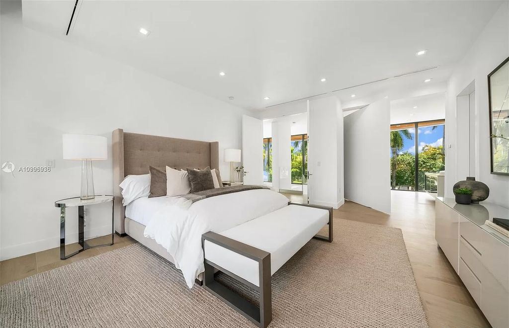 The Home in Miami Beach is a new construction modern oasis located on guard gated Hibiscus Island now available for sale. This home located at 112 W Palm Midway, Miami Beach, Florida; offering 5 bedrooms and 6 bathrooms with over 4,400 square feet of living spaces.