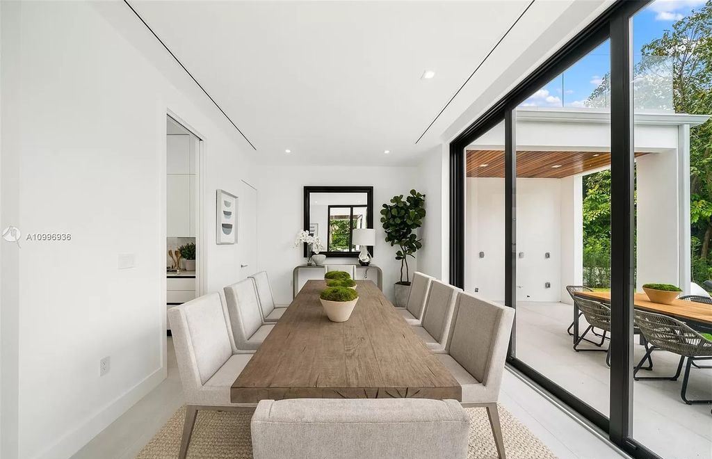 The Home in Miami Beach is a new construction modern oasis located on guard gated Hibiscus Island now available for sale. This home located at 112 W Palm Midway, Miami Beach, Florida; offering 5 bedrooms and 6 bathrooms with over 4,400 square feet of living spaces.