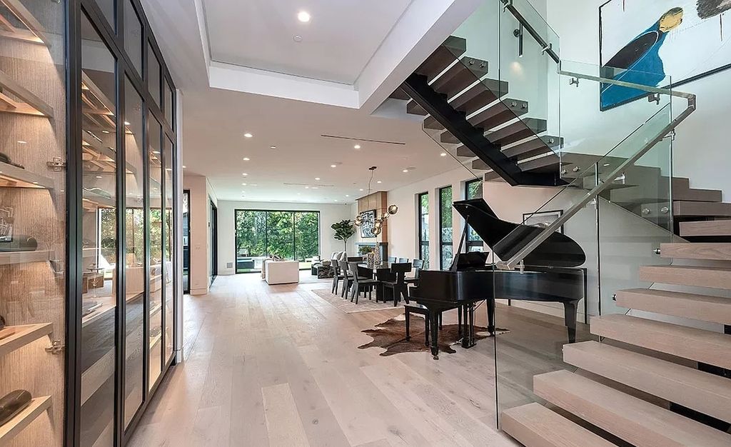 The Home in West Hollywood is an exceptionally engineered newly constructed smart residence now available for sale. This home located at 829 N Ogden Dr, Los Angeles, California; offering 5 bedrooms and 6 bathrooms with over 5,000 square feet of living spaces.