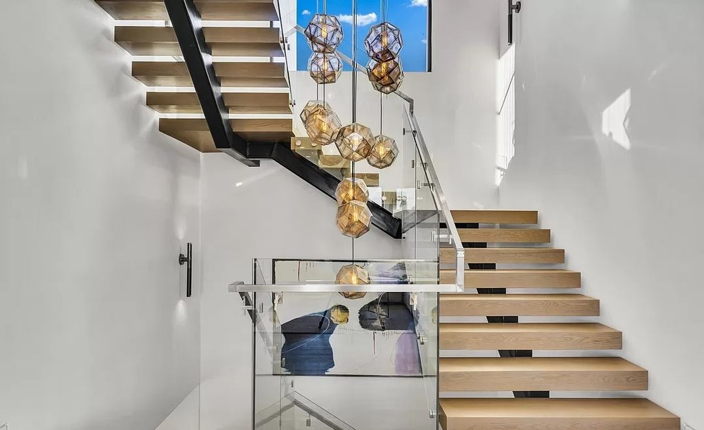 The Home in West Hollywood is an exceptionally engineered newly constructed smart residence now available for sale. This home located at 829 N Ogden Dr, Los Angeles, California; offering 5 bedrooms and 6 bathrooms with over 5,000 square feet of living spaces.