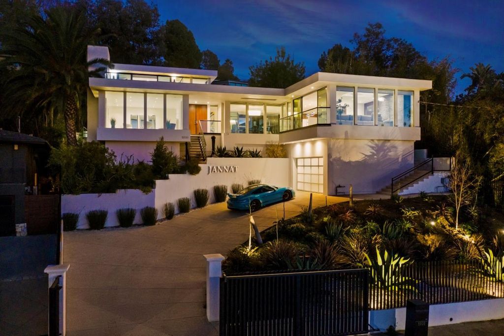 The Los Angeles Home is a Mid-Century Modern retreat boasts jetliner mountain and city views now available for sale. This home located at 8030 Mulholland Dr, Los Angeles, California; offering 3 bedrooms and 6 bathrooms with over 4,500 square feet of living spaces.