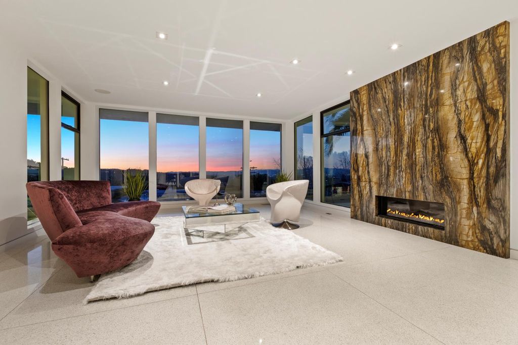 The Los Angeles Home is a Mid-Century Modern retreat boasts jetliner mountain and city views now available for sale. This home located at 8030 Mulholland Dr, Los Angeles, California; offering 3 bedrooms and 6 bathrooms with over 4,500 square feet of living spaces.