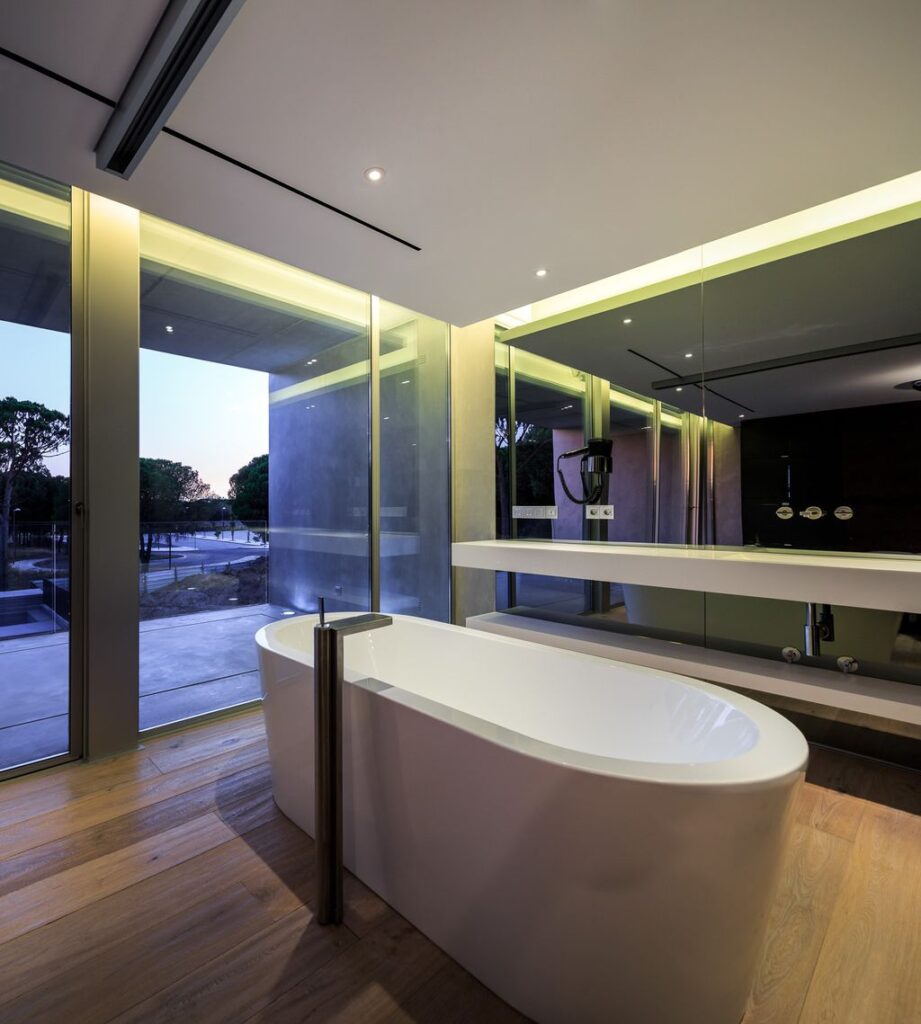 Vilamoura Villa in Portugal was designed by Arquimais Architecture and Design in Modern style offers luxurious living from finest finishes and comfortable amenities.