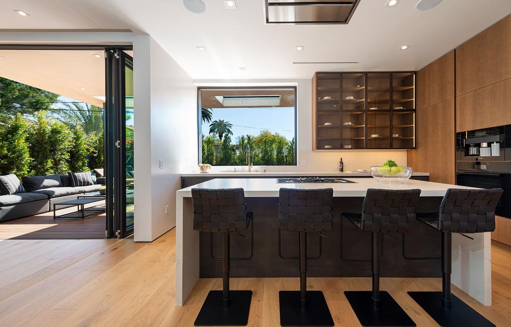 The Home in West Hollywood is a Jae Omar Designed New Construction features indoor-outdoor entertaining spaces now available for sale. This home located at 9024 Rangely Ave, West Hollywood, California; offering 4 bedrooms and 6 bathrooms with over 4,400 square feet of living spaces.