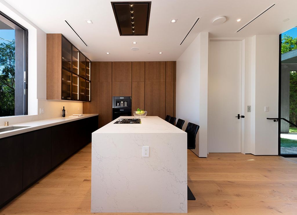 The Home in West Hollywood is a Jae Omar Designed New Construction features indoor-outdoor entertaining spaces now available for sale. This home located at 9024 Rangely Ave, West Hollywood, California; offering 4 bedrooms and 6 bathrooms with over 4,400 square feet of living spaces.