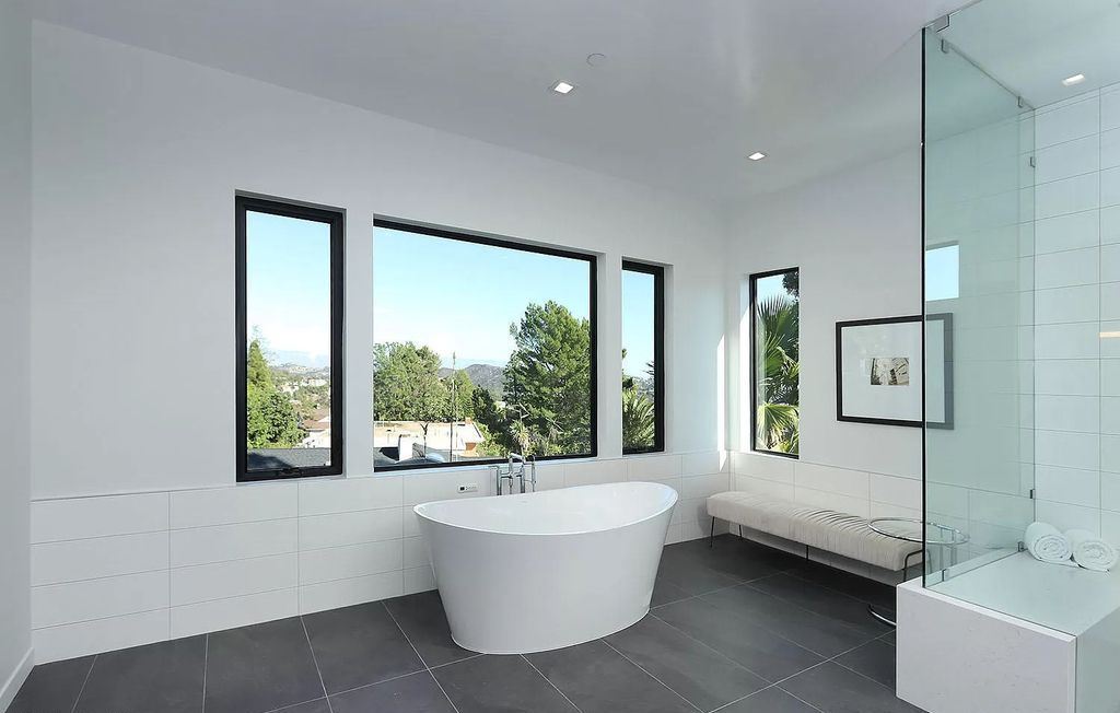 The Contemporary House is a modern masterpiece in prestigious Bel Air with elegant finishes boasts superb indoor, outdoor living now available for sale. This home located at 10825 Vicenza Way, Los Angeles, California; offering 5 bedrooms and 6 bathrooms with over 5,300 square feet of living spaces.