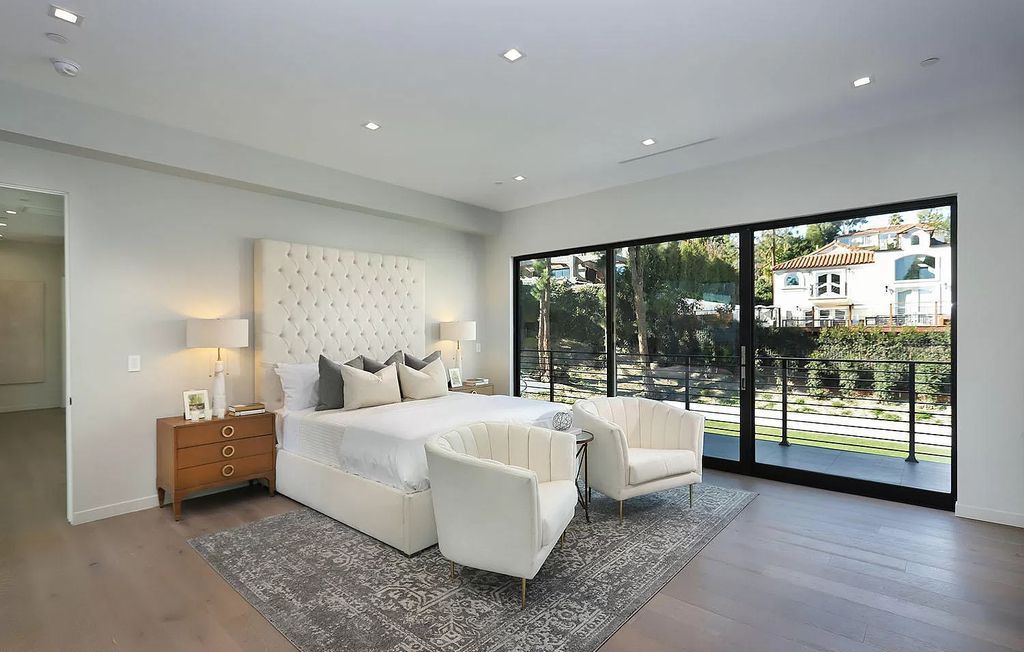 The Contemporary House is a modern masterpiece in prestigious Bel Air with elegant finishes boasts superb indoor, outdoor living now available for sale. This home located at 10825 Vicenza Way, Los Angeles, California; offering 5 bedrooms and 6 bathrooms with over 5,300 square feet of living spaces.