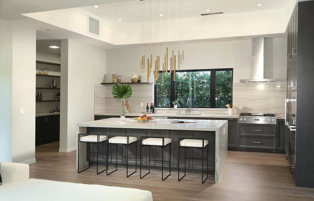 The Contemporary House is a modern masterpiece in prestigious Bel Air with elegant finishes boasts superb indoor, outdoor living now available for sale. This home located at 10825 Vicenza Way, Los Angeles, California; offering 5 bedrooms and 6 bathrooms with over 5,300 square feet of living spaces.