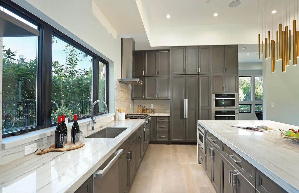 The Contemporary House is a modern masterpiece in prestigious Bel Air with elegant finishes boasts superb indoor, outdoor living now available for sale. This home located at 10825 Vicenza Way, Los Angeles, California; offering 5 bedrooms and 6 bathrooms with over 5,300 square feet of living spaces.