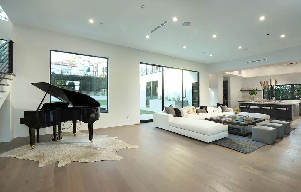 The Contemporary House is a modern masterpiece in prestigious Bel Air with elegant finishes boasts superb indoor, outdoor living now available for sale. This home located at 10825 Vicenza Way, Los Angeles, California; offering 5 bedrooms and 6 bathrooms with over 5,300 square feet of living spaces.