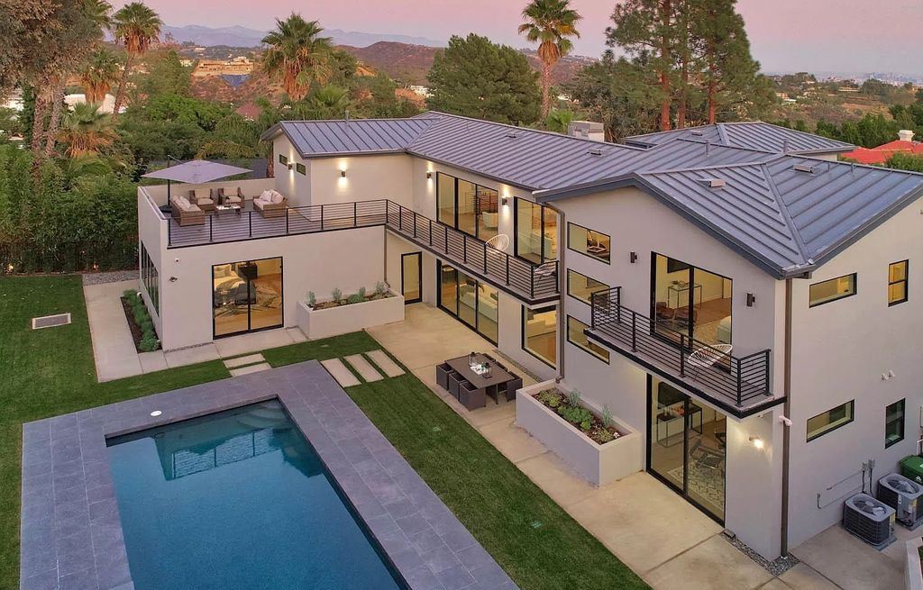 The Contemporary House is a modern masterpiece in prestigious Bel Air with elegant finishes boasts superb indoor, outdoor living now available for sale. This home located at 10825 Vicenza Way, Los Angeles, California; offering 5 bedrooms and 6 bathrooms with over 5,300 square feet of living spaces.