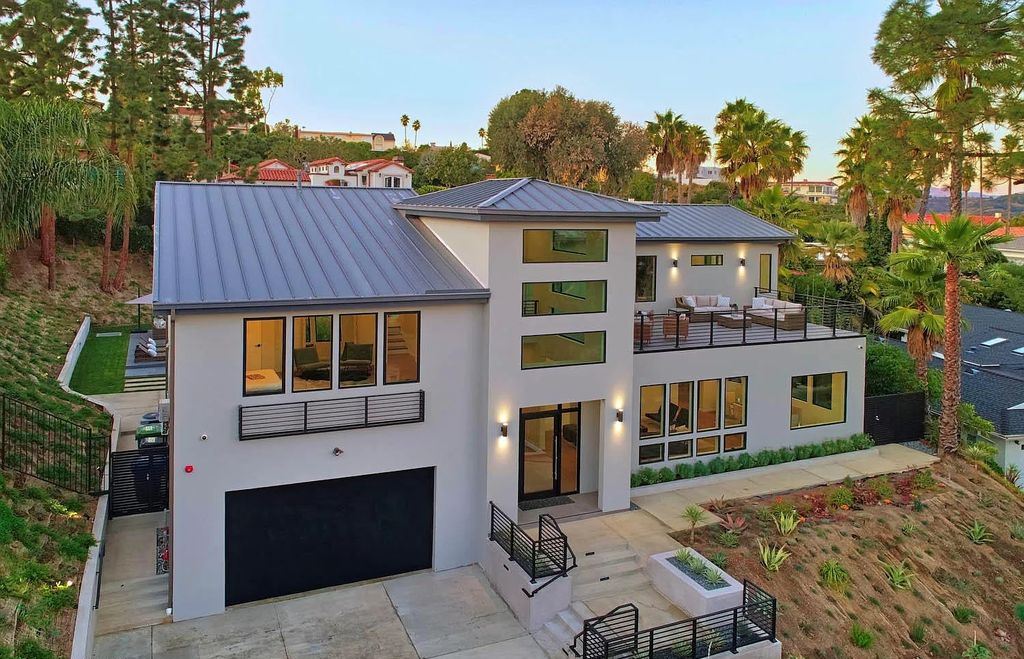 The Contemporary House is a modern masterpiece in prestigious Bel Air with elegant finishes boasts superb indoor, outdoor living now available for sale. This home located at 10825 Vicenza Way, Los Angeles, California; offering 5 bedrooms and 6 bathrooms with over 5,300 square feet of living spaces.