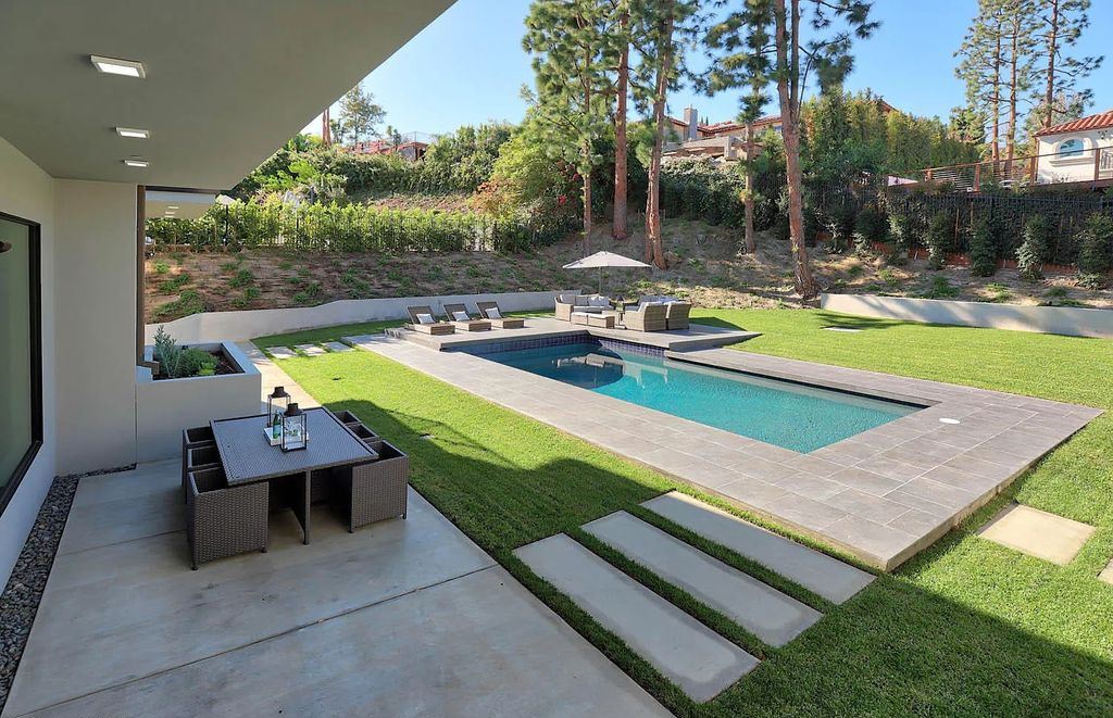 The Contemporary House is a modern masterpiece in prestigious Bel Air with elegant finishes boasts superb indoor, outdoor living now available for sale. This home located at 10825 Vicenza Way, Los Angeles, California; offering 5 bedrooms and 6 bathrooms with over 5,300 square feet of living spaces.