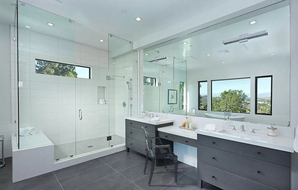 The Contemporary House is a modern masterpiece in prestigious Bel Air with elegant finishes boasts superb indoor, outdoor living now available for sale. This home located at 10825 Vicenza Way, Los Angeles, California; offering 5 bedrooms and 6 bathrooms with over 5,300 square feet of living spaces.
