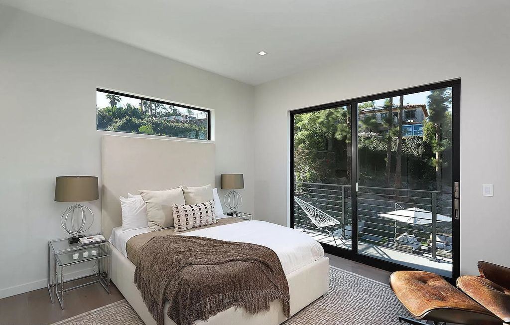 The Contemporary House is a modern masterpiece in prestigious Bel Air with elegant finishes boasts superb indoor, outdoor living now available for sale. This home located at 10825 Vicenza Way, Los Angeles, California; offering 5 bedrooms and 6 bathrooms with over 5,300 square feet of living spaces.